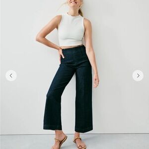 White Sleeveless Crop Top and Dark Blue Wide-Leg Jeans